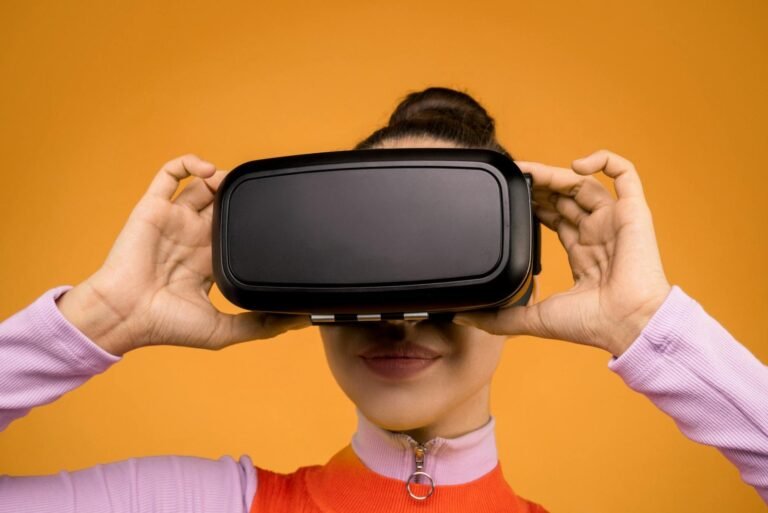woman in long sleeve shirt holding vr headset